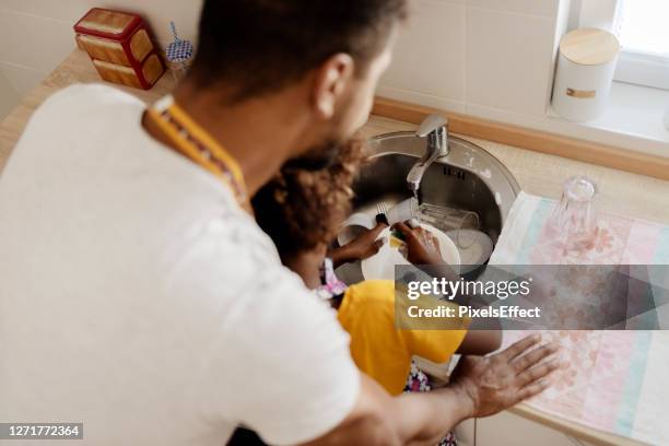 taking on some daily chores - sweeping dirt stock pictures, royalty-free photos & images