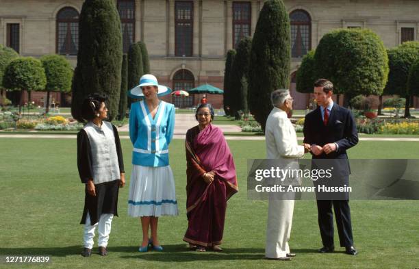 Prince Charles, Prince of Wales , Diana, Princess of Wales , wearing a blue and white suit designed by Catherine Walker and a Philip Somerville hat,...