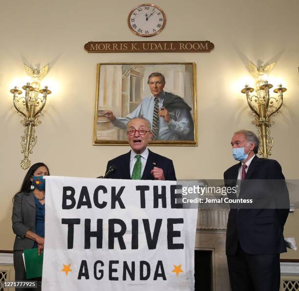 Senator Chuck Schumer speaks along side Representative Deb Haaland and Senator Ed Markey at the Back the Thrive Agenda press conference at the...