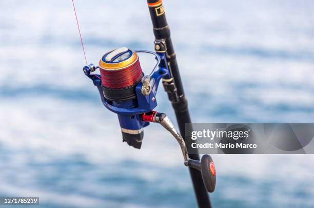 fishing rod - fishing reel foto e immagini stock