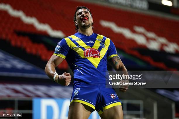 Anthony Gelling of Warrington Wolves celebrates scoring his sides first try during the match between Castleford Tigers and Warrington Wolves at...