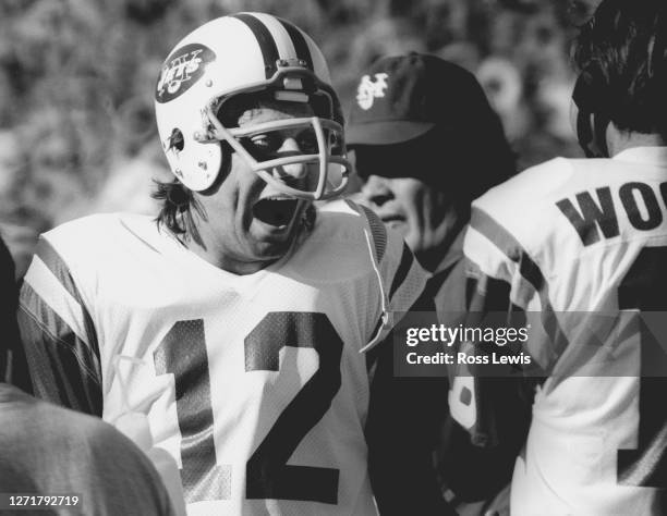 Joe Namath, Quarterback of the New York Jets, screams with delight to backup Quarterback Al Woodall as the New York Jets defeated the New York Giants...