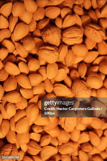 full frame shot of peanuts - carpintero stock-fotos und bilder