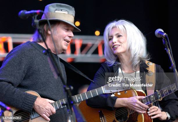 Neil Young and Emmylou Harris perform during Neil Young's 19th Annual Bridge School Benefit at Shoreline Amphitheatre on October 29, 2005 in Mountain...