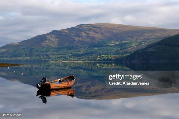 boat on loch broom - sea loch stock pictures, royalty-free photos & images