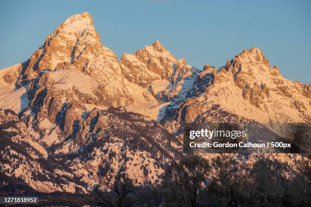 scenic view of snowcapped mountains against clear sky, bozeman, united states - bozeman stock pictures, royalty-free photos & images