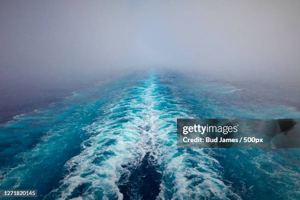 aerial view of sea against sky, tkrah, libya - kielwasser stock-fotos und bilder