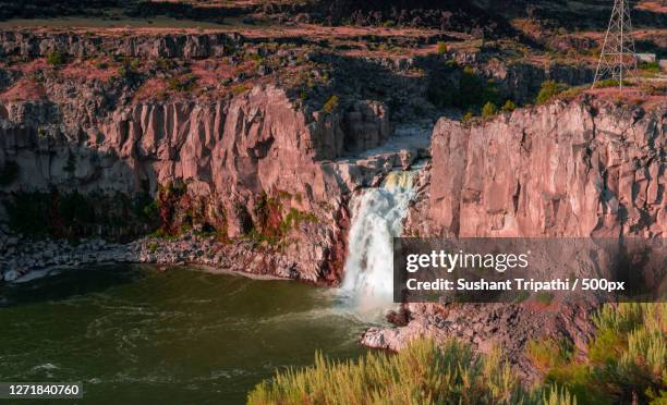 scenic view of waterfall, idaho falls, united states - idaho falls stock-fotos und bilder