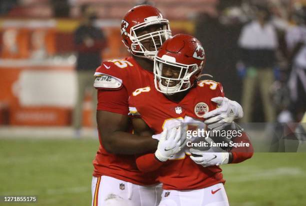 Jarius Sneed of the Kansas City Chiefs is congratulated after an interception against the Houston Texans during the fourth quarter at Arrowhead...