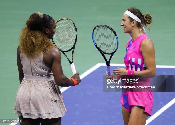 Victoria Azarenka of Belarus talks with Serena Williams of the United States after winning their Women's Singles semifinal match on Day Eleven of the...