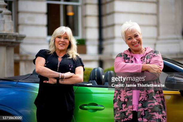 Denise Welch and Samantha Fox pose with the rainbow Bentley during the "Henpire" podcast launch event at Langham Hotel on September 10, 2020 in...