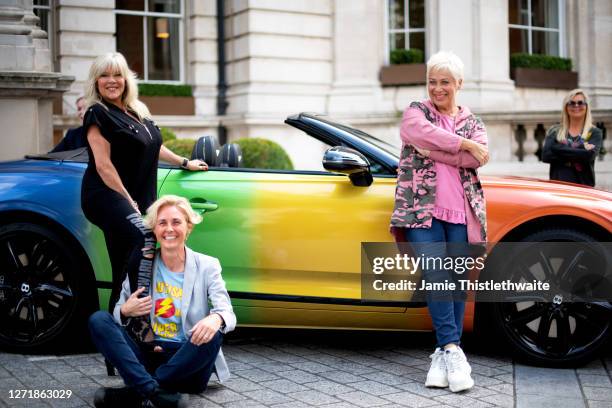 Denise Welch, Samantha Fox, Samantha Grierson pose with the rainbow Bentley during the "Henpire" podcast launch event at Langham Hotel on September...