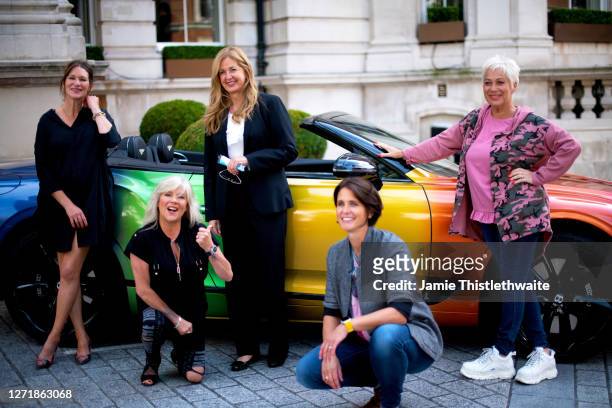 Heather Peace, Denise Welch, Samantha Fox, Patricia Potter and the GM of The Langham pose with the rainbow Bentley during the "Henpire" podcast...