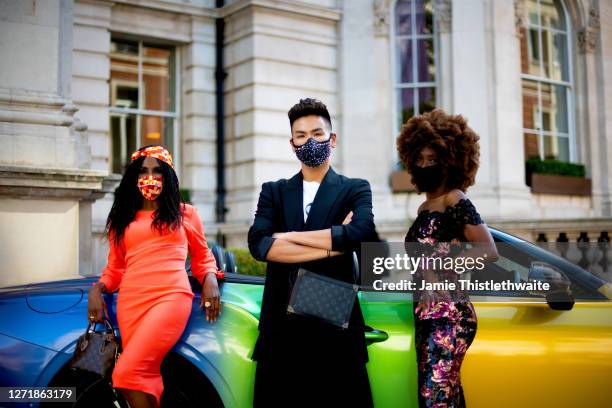 Heather Small, Sinitta and Vincent Wong pose with the rainbow Bentley during the "Henpire" podcast launch event at Langham Hotel on September 10,...