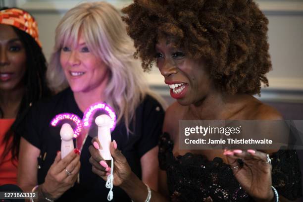 Heather Small laughs at a joke made during the "Henpire" podcast launch event at Langham Hotel on September 10, 2020 in London, England.