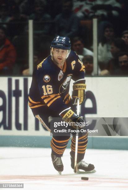 Pat LaFontaine of the Buffalo Sabers skates against the New Jersey Devils during an NHL Hockey game circa 1992 at the Brendan Byrne Arena in East...