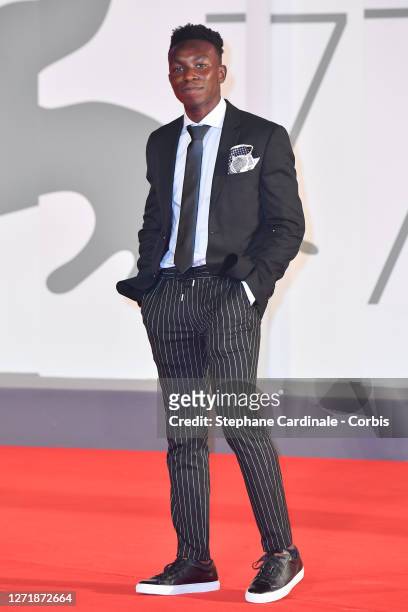 Olly Sholotan walks the red carpet ahead of the movie "Run Hide Fight" at the 77th Venice Film Festival on September 10, 2020 in Venice, Italy.