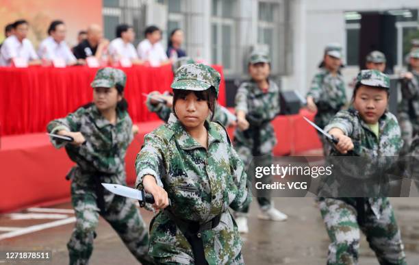 Freshmen take part in a military training at Jiangsu City Vocational College on September 11, 2020 in Nantong, Jiangsu Province of China.