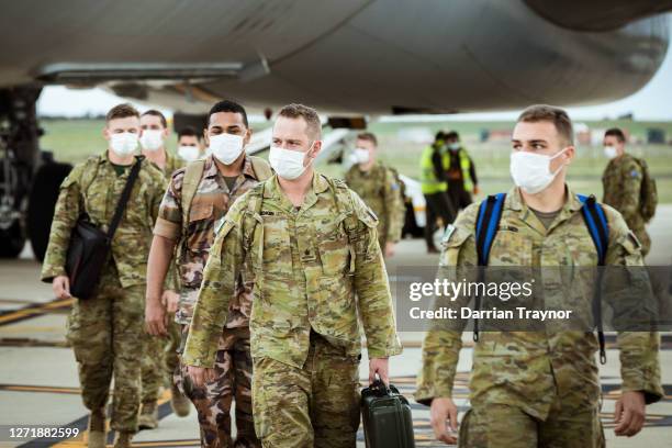 Australian Defence Force troops disembark an Australian Air Force plane at Avalon Airport on September 11, 2020 in Avalon, Australia. Australian...