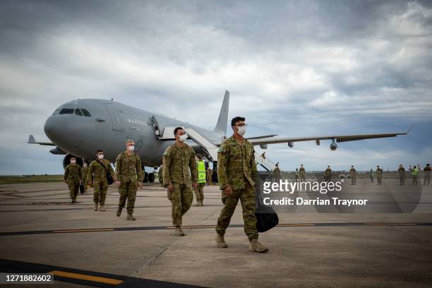 Australian Defence Force troops disembark an Australian Air Force plane at Avalon Airport on September 11, 2020 in Avalon, Australia. Australian...