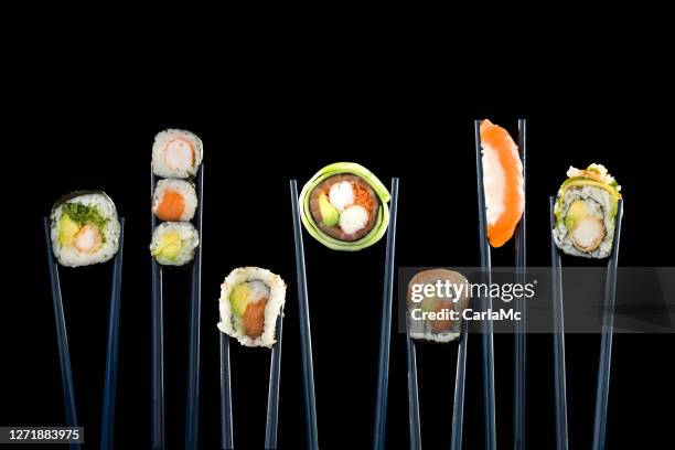 お箸を並べた寿司の種類 - 天ぷら ストックフォトと画像