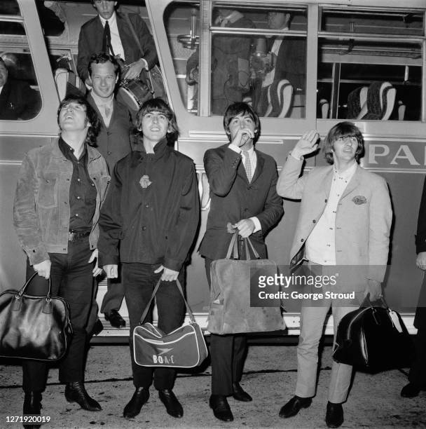English rock band the Beatles arrive at London Airport from the USA, with their manager Brian Epstein , 2nd September 1965. From left to right, John...