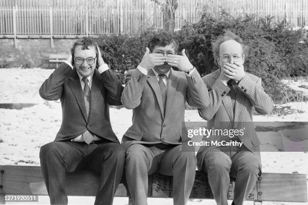From left to right, BBC weathermen Ian McCaskill , Bill Giles and Michael Fish pose as the three wise monkeys in the snow, UK, 11th February 1985.