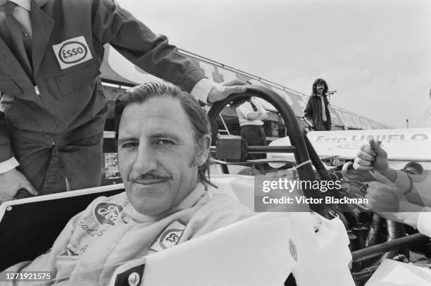 British racing driver Graham Hill test drives a Brabham Ford BT39 with a Ford-Weslake V12 engine at Silverstone, UK, 31st August 1972.