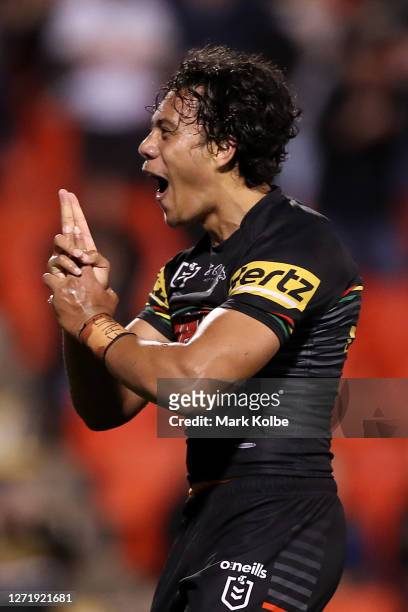 Jarome Luai of the Panthers celebrates scoring a try during the round 18 NRL match between the Penrith Panthers and the Parramatta Eels at Panthers...