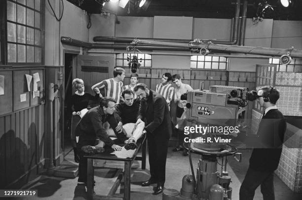 Filming a scene for the BBC television series 'United!', which revolves around fictional football team Brentwich United, UK, 1965. Actress Mitzi...