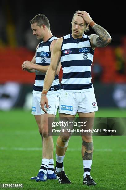 Tom Stewart of the Cats looks dejected during the round 17 AFL match between the Geelong Cats and the Richmond Tigers at Metricon Stadium on...