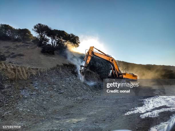 construction machine destructing the natural land - tree removal stock pictures, royalty-free photos & images