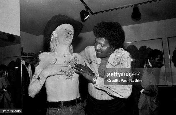 American Blues musicians Johnny Winter and Albert Collins backstage at Park West, Chicago, Illinois, February 10, 1984.