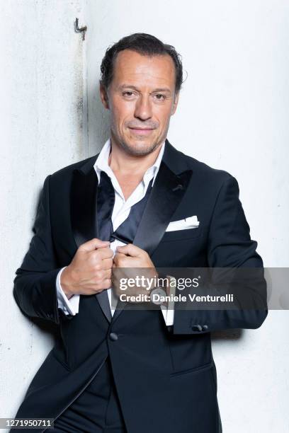 Stefano Accorsi poses for the photographer at the 77th Venice Film Festival on September 10, 2020 in Venice, Italy.