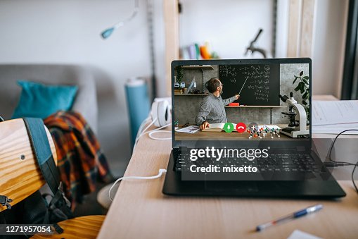 Distance Learning From Home Desk Distance Learning From Home On Video Conference High-Res Stock Photo ...