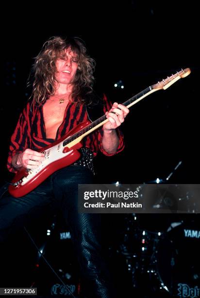 English Rock musician John Sykes, of the group Whitesnake, performs onstage at the Reunion Arena, Dallas, Texas, October 21, 1984.