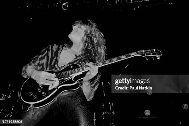 English Rock musician John Sykes, of the group Whitesnake, performs onstage at the UIC Pavilion, Chicago, Illinois, November 10, 1984.