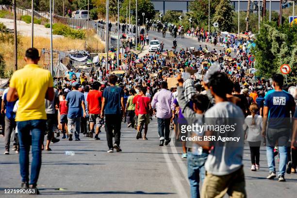Refugees are seen protesting in the wake of the burning down op Camp Moria on September 11, 2020 in Kara Tepe, Greece. After Moria refugee camp was...