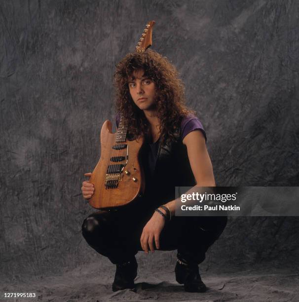 Portrait of American Rock musician Reb Beach, of the group Winger,a s he poses in a photo studio, Chicago, Illinois, March 12, 1989.