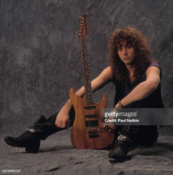Portrait of American Rock musician Reb Beach, of the group Winger,a s he poses in a photo studio, Chicago, Illinois, March 12, 1989.