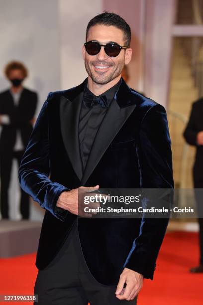 Miguel Ángel Silvestre walks the red carpet ahead of the movie "30 Monedas" - Episode 1 at the 77th Venice Film Festival on September 11, 2020 in...