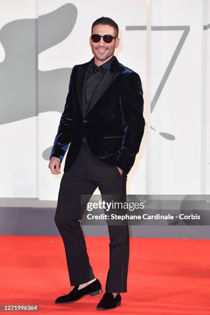 Miguel Ángel Silvestre walks the red carpet ahead of the movie "30 Monedas" - Episode 1 at the 77th Venice Film Festival on September 11, 2020 in...