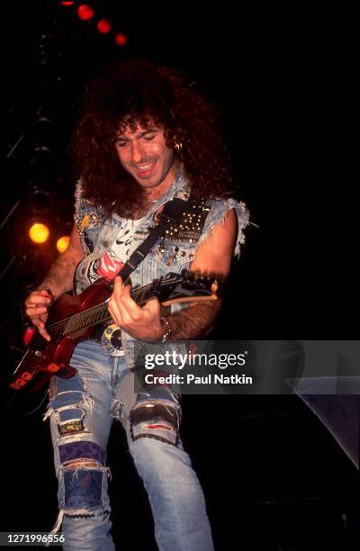 American Rock musician Paul Taylor, of the group Winger, performs onstage at the Poplar Creek Music Theater, Hoffman Estates, Illinois, July 27, 1989.