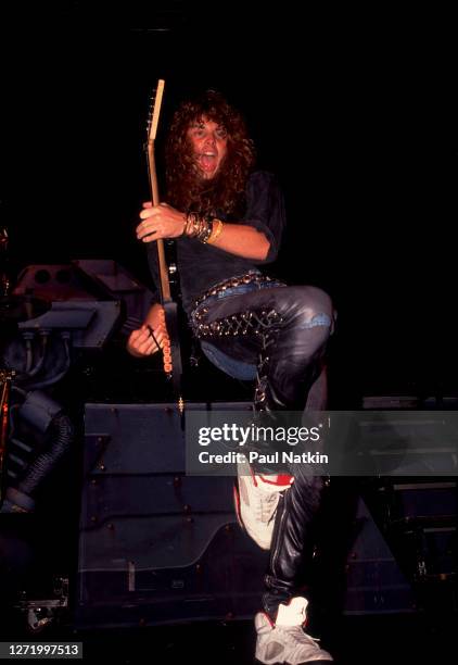 American Rock musician Reb Beach, of the group Winger, performs onstage at the Poplar Creek Music Theater, Hoffman Estates, Illinois, July 27, 1989.