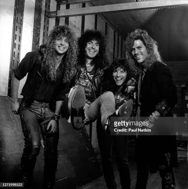Portrait of the members of American rock group Winger as they pose backstage at the Alpine Valley Music Theater, East Troy, Wisconsin, September 27,...