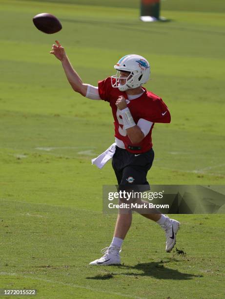 Jake Rudock of the Miami Dolphins conducts drills during training camp at Baptist Health Training Facility at Nova Southern University on September...