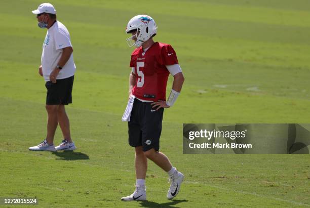 Jake Rudock of the Miami Dolphins conducts drills during training camp at Baptist Health Training Facility at Nova Southern University on September...