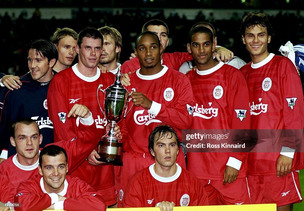 The Liverpool team celebrate winning the Pirelli trophy