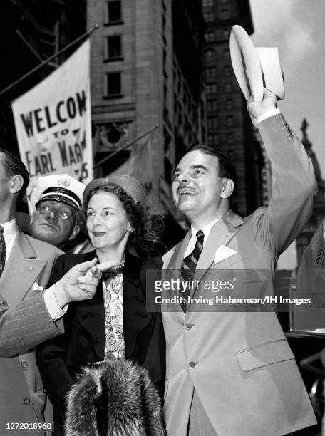 Frances Hutt Dewey and her husband American lawyer, prosecutor, politician and Republican presidential candidate Thomas E. Dewey wave to supporters...