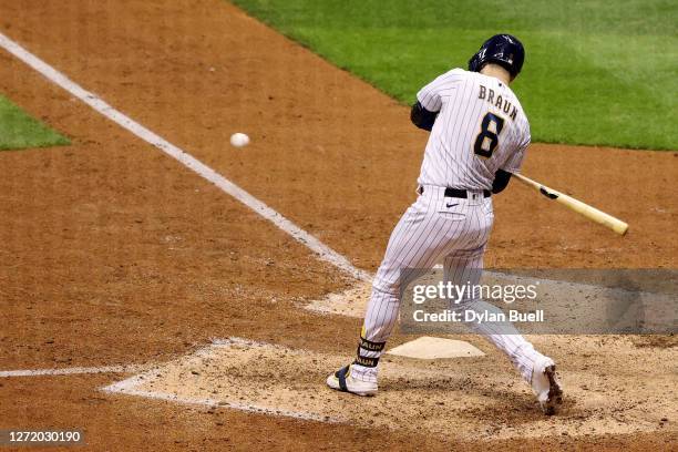 Ryan Braun of the Milwaukee Brewers hits a sacrifice fly in the ninth inning to beat the Chicago Cubs 1-0 at Miller Park on September 11, 2020 in...